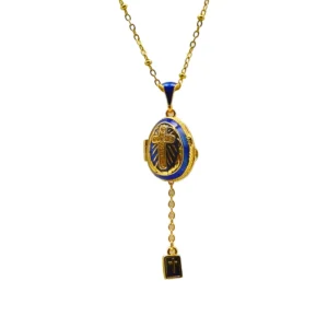 COLLIER PENDENTIF ŒUF STYLE FABERGÉ "BLEU ROI & PAROLE VIVANTE" - ÉMAIL BLEU ROI CROIX RAYONNANTE ET MINUSCULE BIBLE CACHÉE