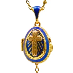 COLLIER PENDENTIF ŒUF STYLE FABERGÉ "BLEU ROI & PAROLE VIVANTE" - ÉMAIL BLEU ROI CROIX RAYONNANTE ET MINUSCULE BIBLE CACHÉE