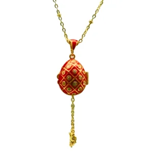 Collier œuf impérial rouge ouvrant avec ange – bijou spirituel élégant