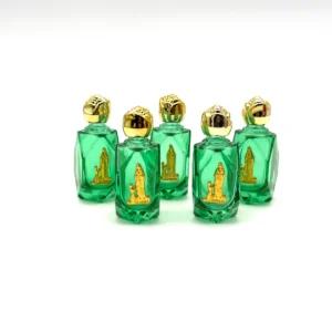 Lot de fioles en verre décorées de la Vierge de Lourdes, avec bouchons dorés